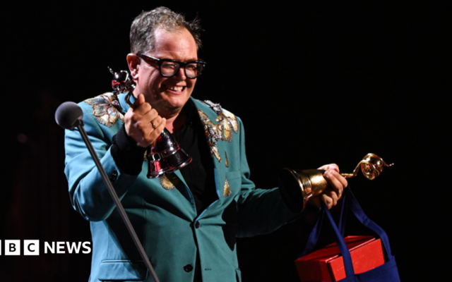 Alan Carr holds back tears on special night at National Television Awards