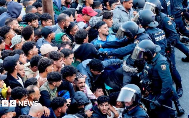 Police begin operation to move migrants from Ceuta beaches