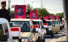 حشدالشعبی به مناسبت خروج آمریکا رژه پیروزی در بغداد برگزار کرد