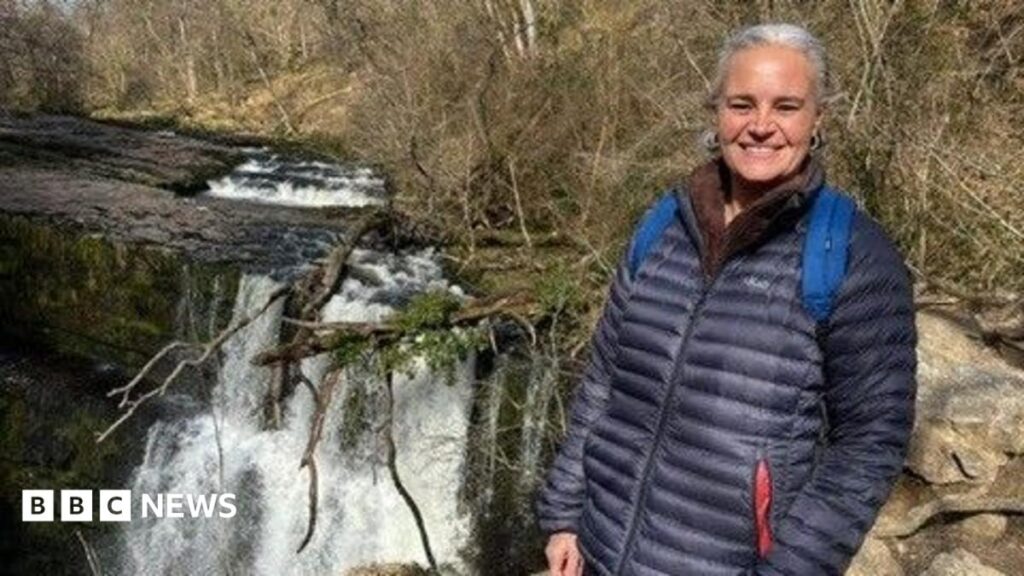 Man, 61, charged with murder after 'stabbed' woman dies following crash