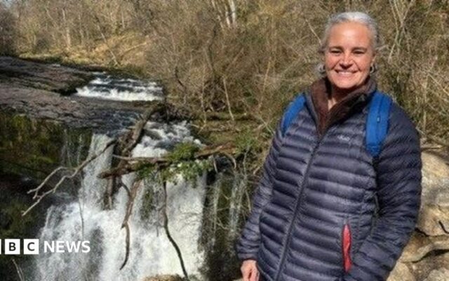 Man, 61, charged with murder after 'stabbed' woman dies following crash