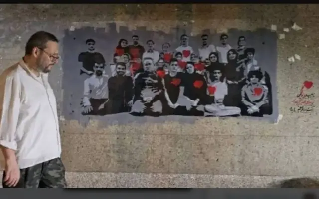 هنرمندی که در دل جنگ، روایت شهدا را بر دیوارهای تهران نقش زد