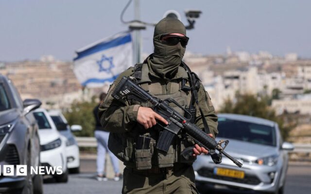 Five Israelis wounded and two suspected Palestinian attackers killed in West Bank shooting
